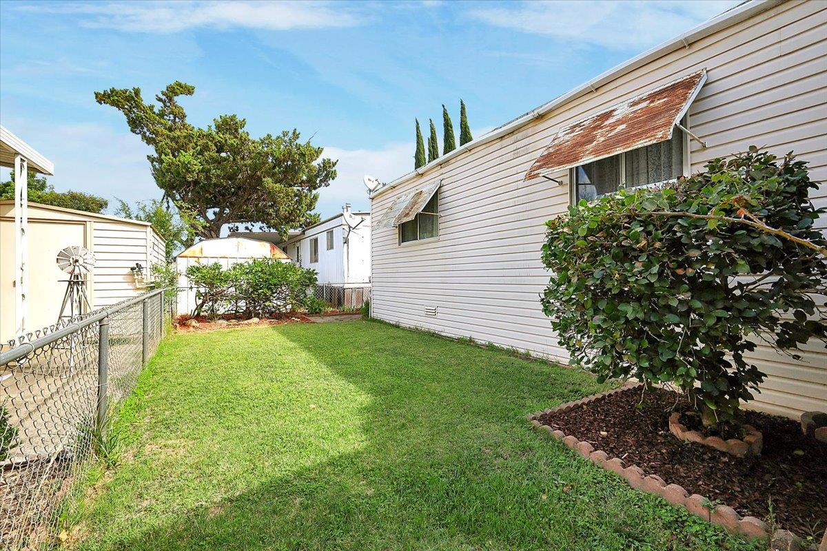 10383 Larkin Road, Unit 43 Live Oak, CA 95953 - Photo 6 of 26 a house view with a garden space