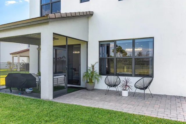 a view of a patio with swimming pool