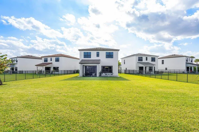 a view of a lake with a big yard