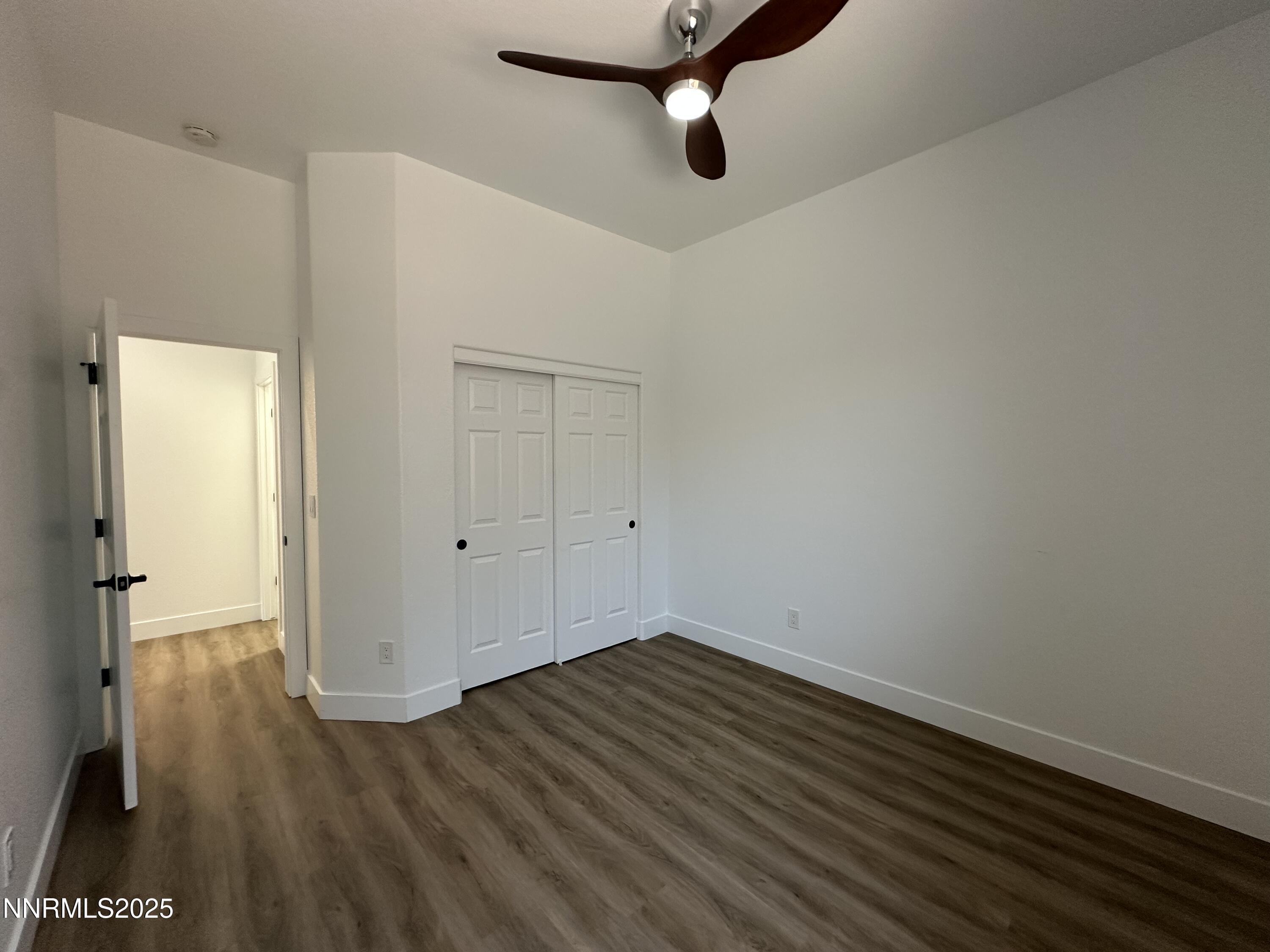 9533 Steep Climb Court Reno, NV 89521 - Photo 23 of 34 a view of a room with wooden floor