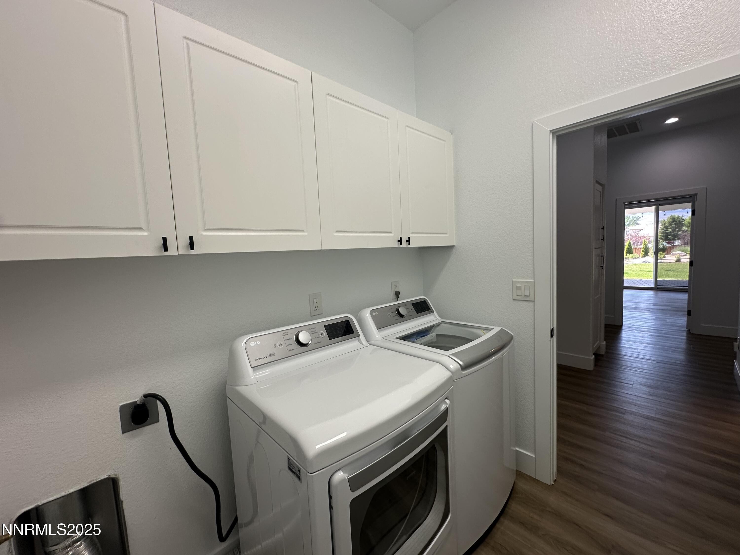 9533 Steep Climb Court Reno, NV 89521 - Photo 25 of 34 a utility room with washer and dryer