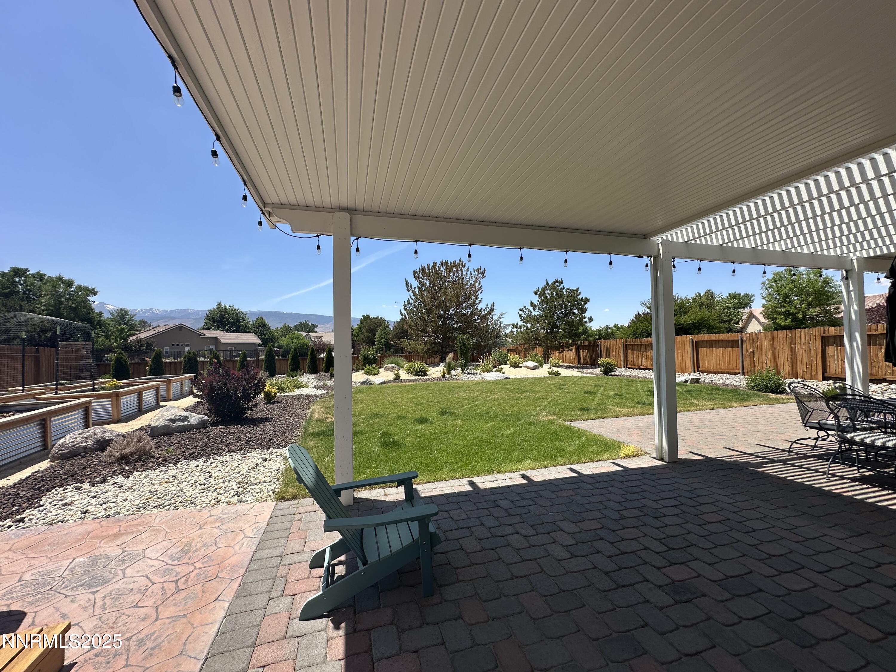 9533 Steep Climb Court Reno, NV 89521 - Photo 32 of 34 a view of a backyard with sitting area