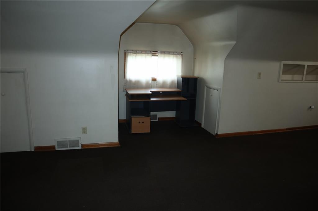 721 Spring Street Roscoe, PA 15477 - Photo 19 of 30 a view of a workspace room with wooden floor and a window