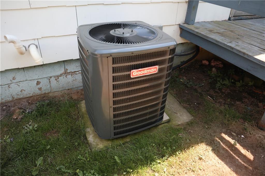 721 Spring Street Roscoe, PA 15477 - Photo 30 of 30 a kitchen with a sink and a stove