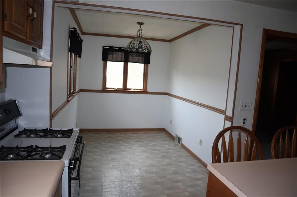 721 Spring Street Roscoe, PA 15477 - Photo 5 of 30 a view of staircase and cabinetry