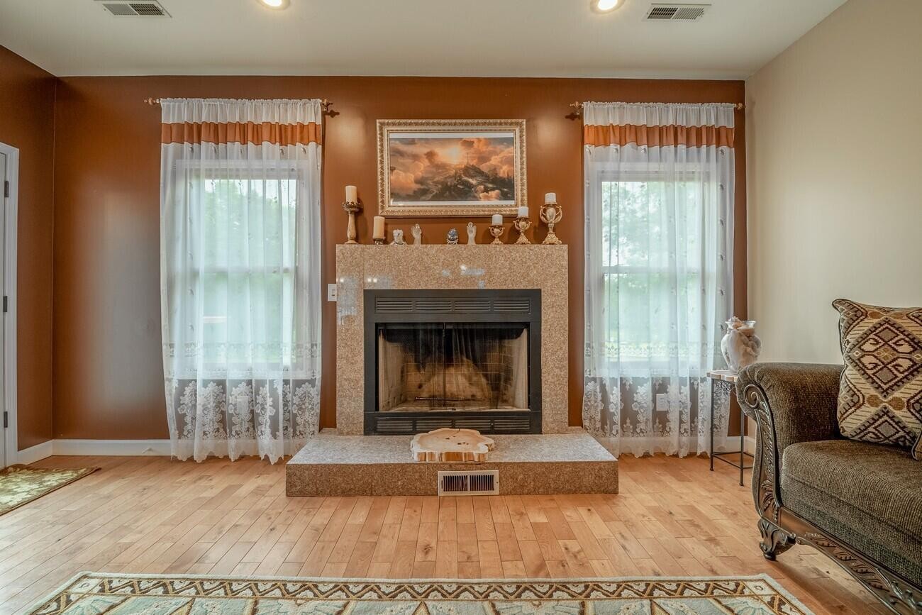 11511 Blair Road Apison, TN 37302 - Photo 25 of 76 a living room with furniture and a fireplace