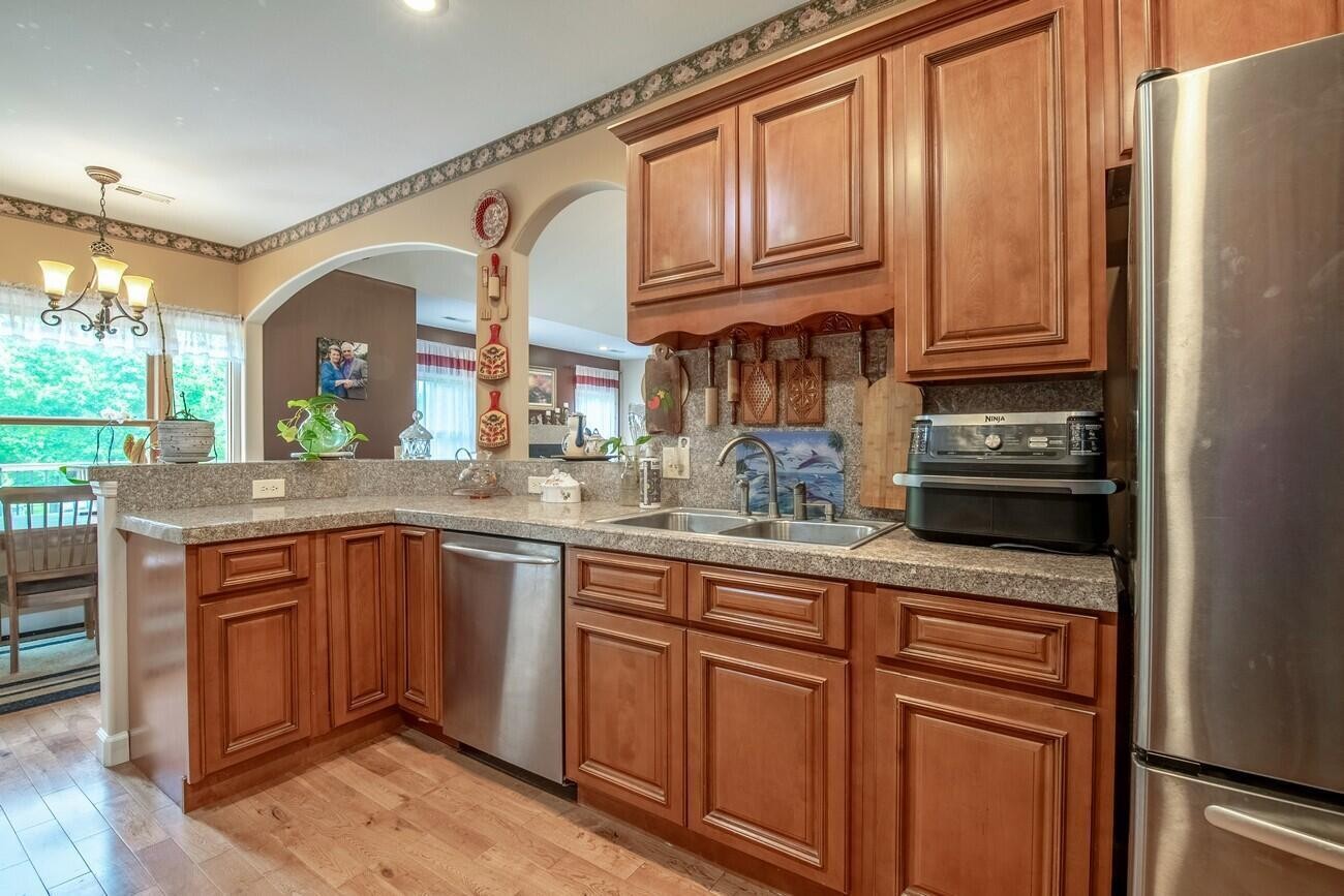 11511 Blair Road Apison, TN 37302 - Photo 27 of 76 a kitchen with stainless steel appliances granite countertop a refrigerator and a sink