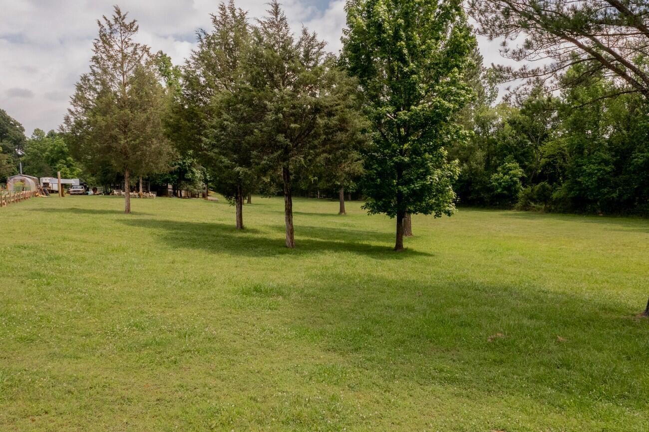 11511 Blair Road Apison, TN 37302 - Photo 65 of 76 a view of outdoor space with deck and yard