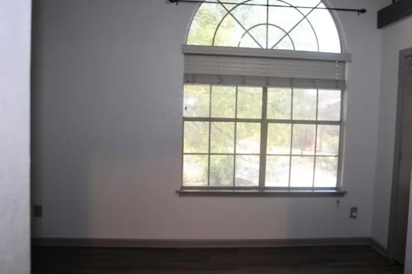 an empty room with a window