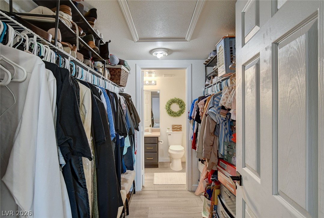 64 Brown Swallow Way Henderson, NV 89012 - Photo 26 of 42 Walk in closet with light wood finished floors