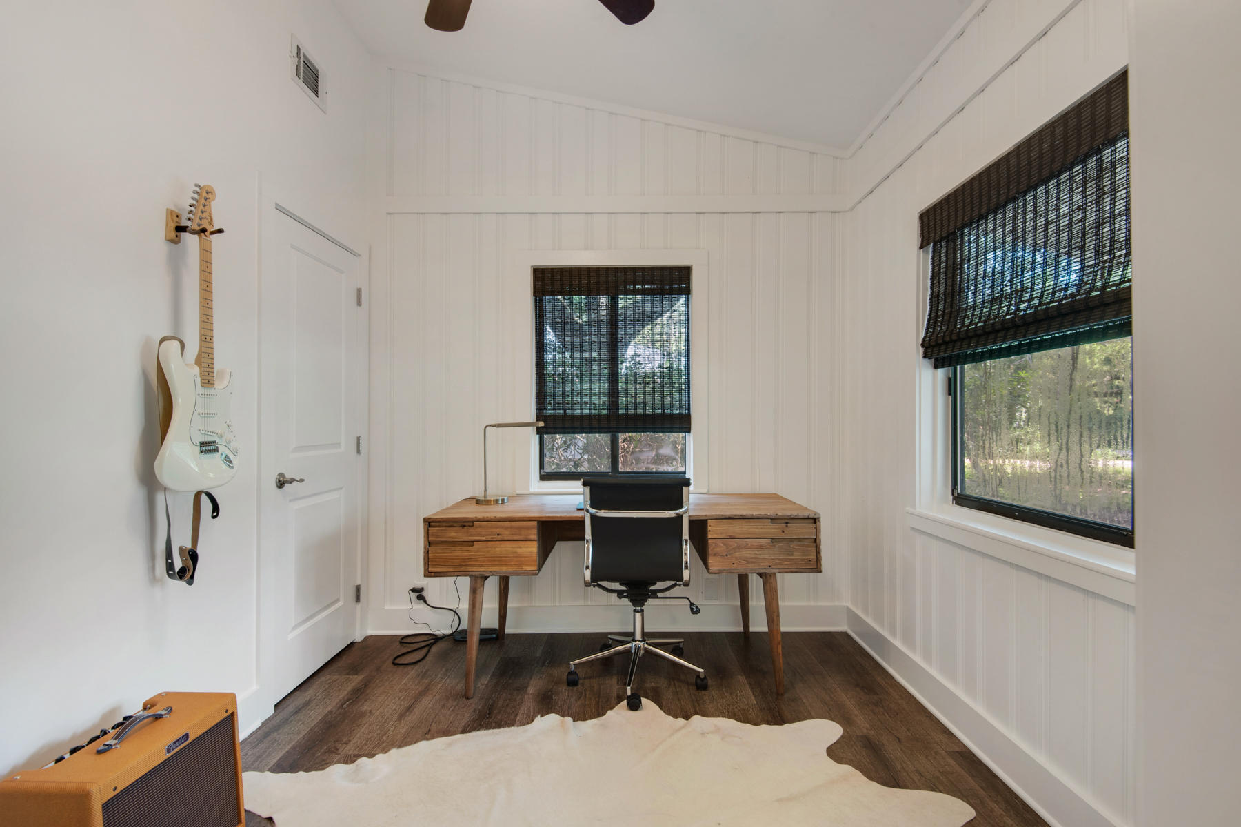 537 Ricker Avenue Santa Rosa Beach, FL 32459 - Photo 11 of 18 a workspace with wooden floor and a window