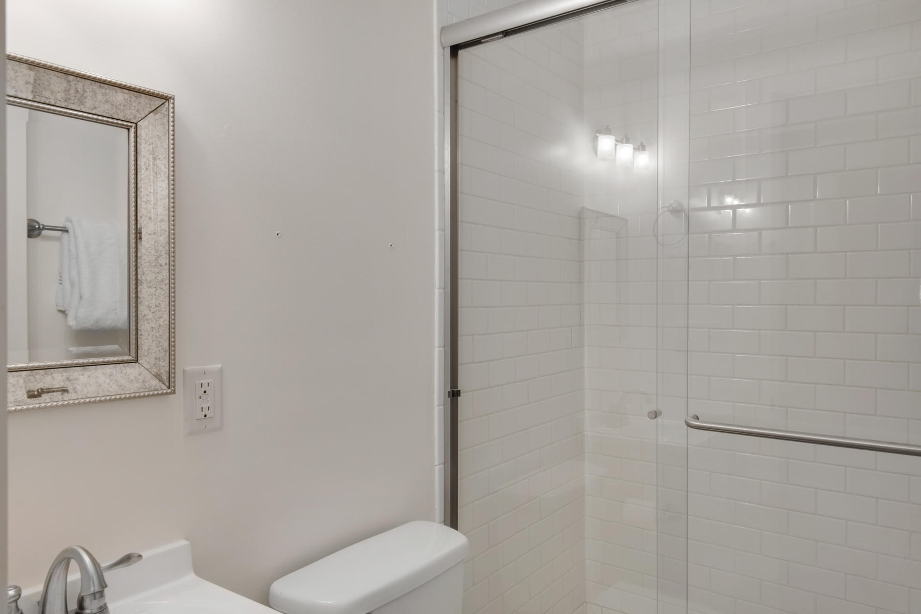 537 Ricker Avenue Santa Rosa Beach, FL 32459 - Photo 12 of 18 a bathroom with a shower a toilet and sink