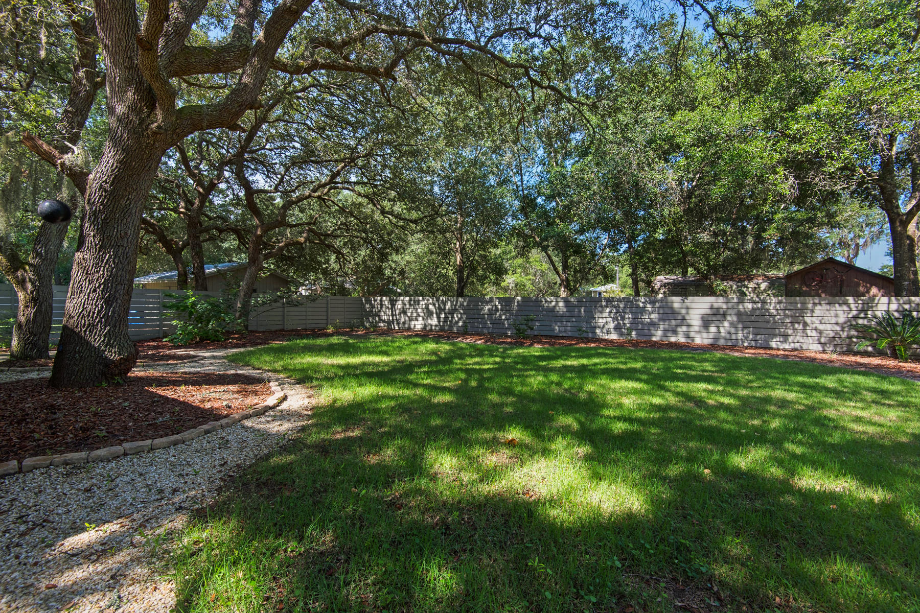 537 Ricker Avenue Santa Rosa Beach, FL 32459 - Photo 16 of 18 a view of yard with green space