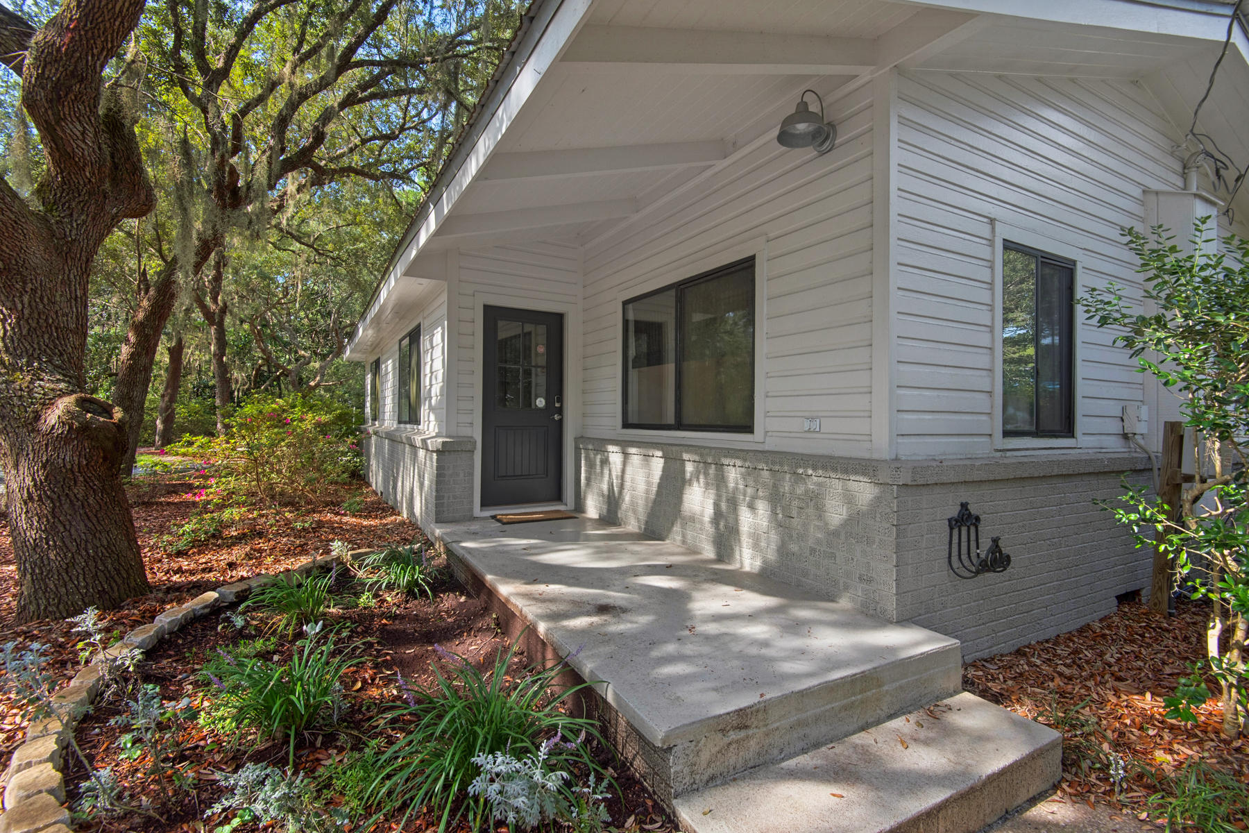 537 Ricker Avenue Santa Rosa Beach, FL 32459 - Photo 18 of 18 a front view of a house with garden