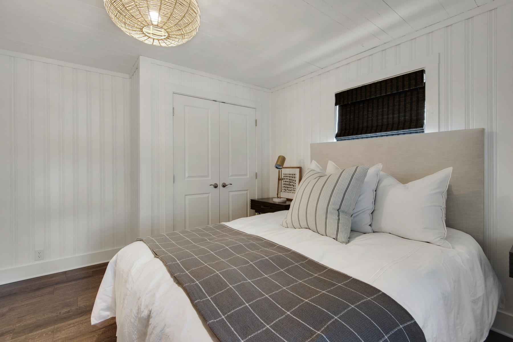 537 Ricker Avenue Santa Rosa Beach, FL 32459 - Photo 9 of 18 a bedroom with a bed and a chandelier