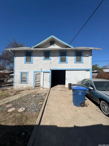 a front view of a house with yard