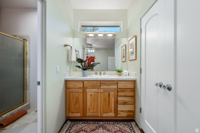 779 South Silver Road Leeds, UT 84746 - Photo 37 of 80 Full bath featuring vanity, a shower stall, and a ceiling fan