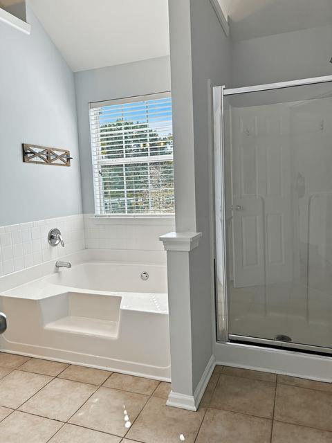 4350 Defoors Farm Trail Powder Springs, GA 30127 - Photo 37 of 47 a bathroom with a bathtub and a shower