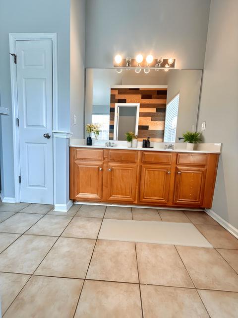 4350 Defoors Farm Trail Powder Springs, GA 30127 - Photo 39 of 47 a view of kitchen with granite countertop a sink and a counter top space