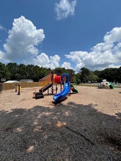 4350 Defoors Farm Trail Powder Springs, GA 30127 - Photo 46 of 47 a view of a lake with houses