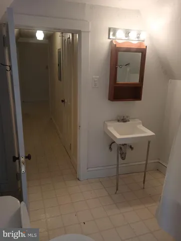 a bathroom with a sink and a toilet