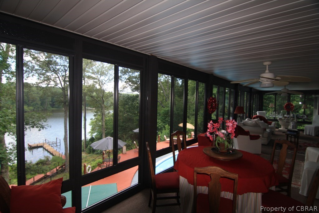 1472 Laurel Point Road Lancaster, VA 22503 - Photo 36 of 40 a outdoor dining space with furniture and garden view
