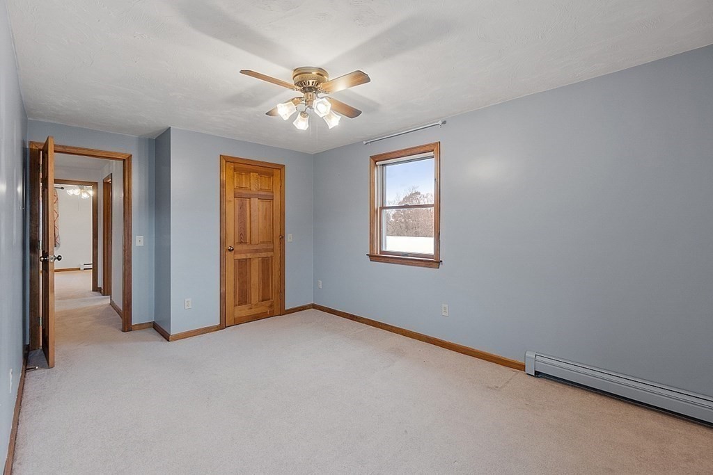88 North End Road Townsend, MA 01469 - Photo 22 of 42 a view of an empty room with a window