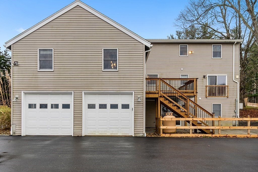 88 North End Road Townsend, MA 01469 - Photo 3 of 42 a view of a house with a garage