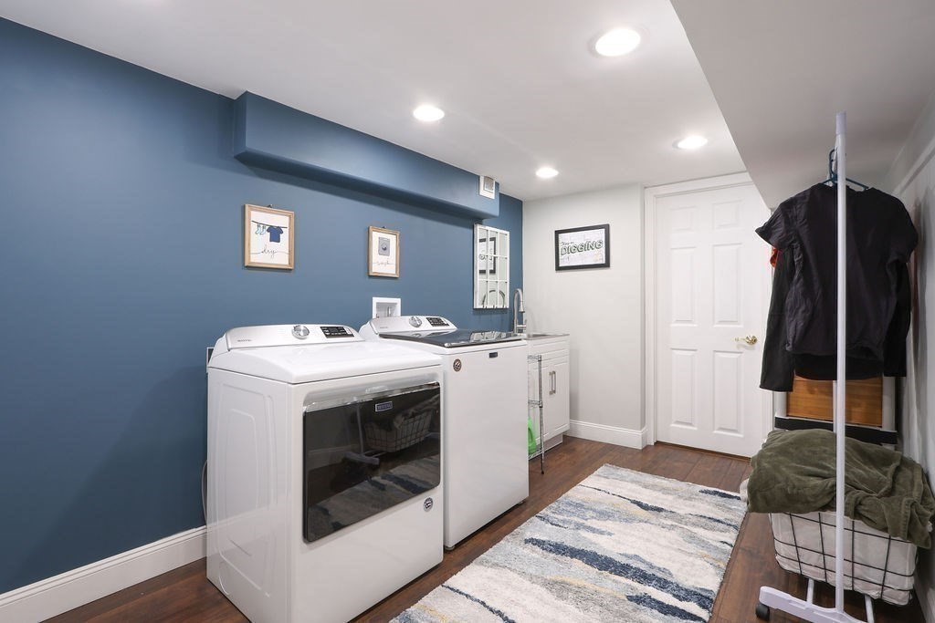 51 Forest Street Reading, MA 01867 - Photo 17 of 22 a utility room with dryer and washer