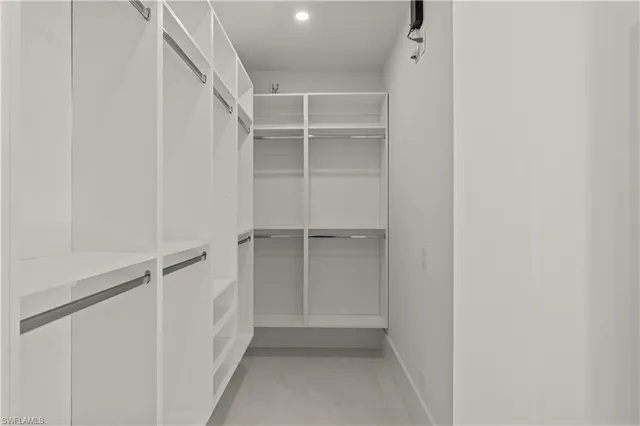 a view of an empty walk in closet