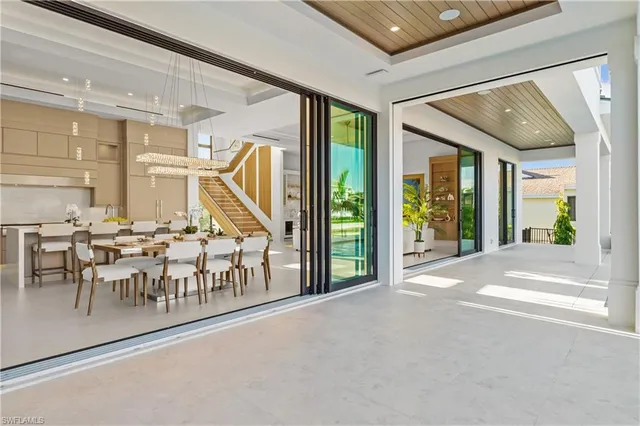 a view of a livingroom with furniture and white walls