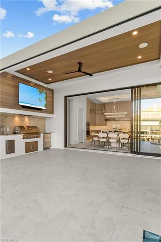 a view of an empty room with a fireplace