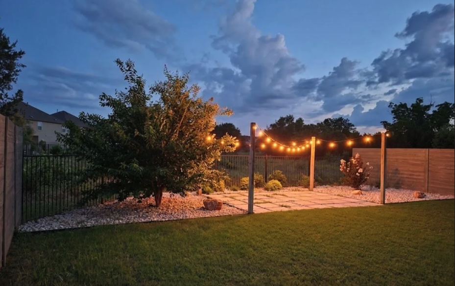 432 Clear Springs Road Georgetown, TX 78628 - Photo 1 of 39 Illuminated patio lights create a captivating ambiance for outdoor entertaining.