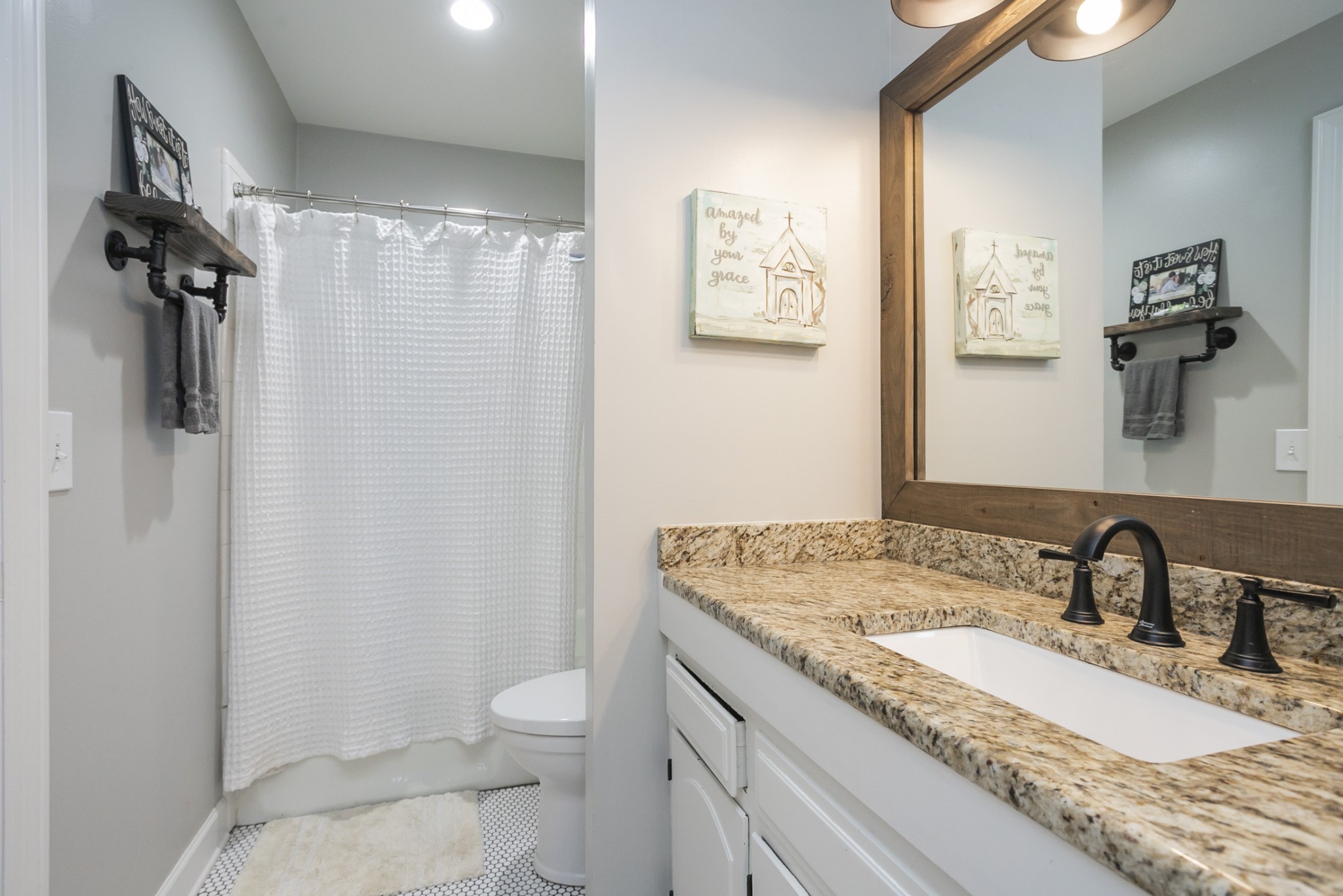 511 Arbor Drive Franklin, TN 37069 - Photo 13 of 24 a bathroom with a granite countertop sink toilet and shower