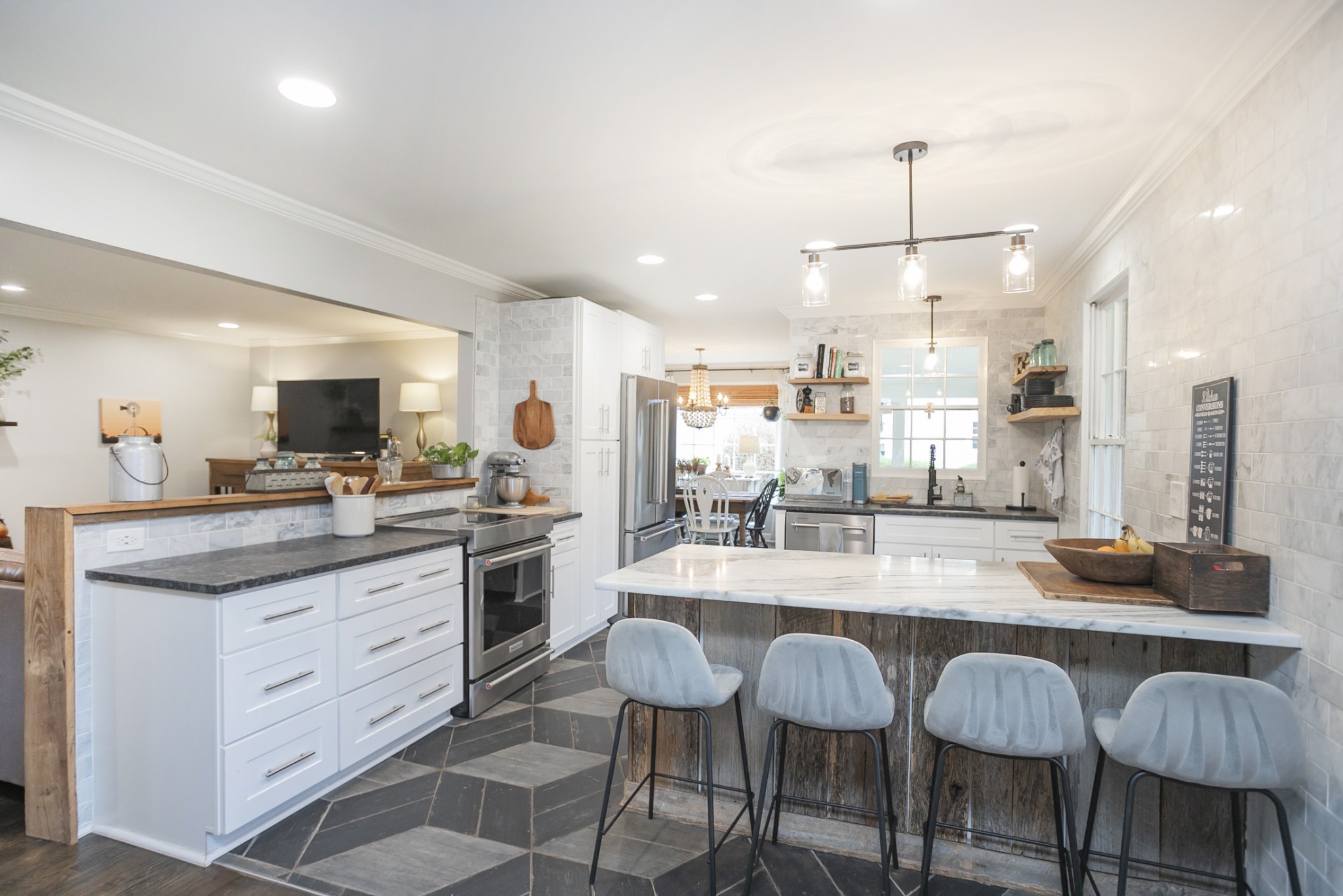 511 Arbor Drive Franklin, TN 37069 - Photo 15 of 24 a kitchen with granite countertop cabinets and chairs
