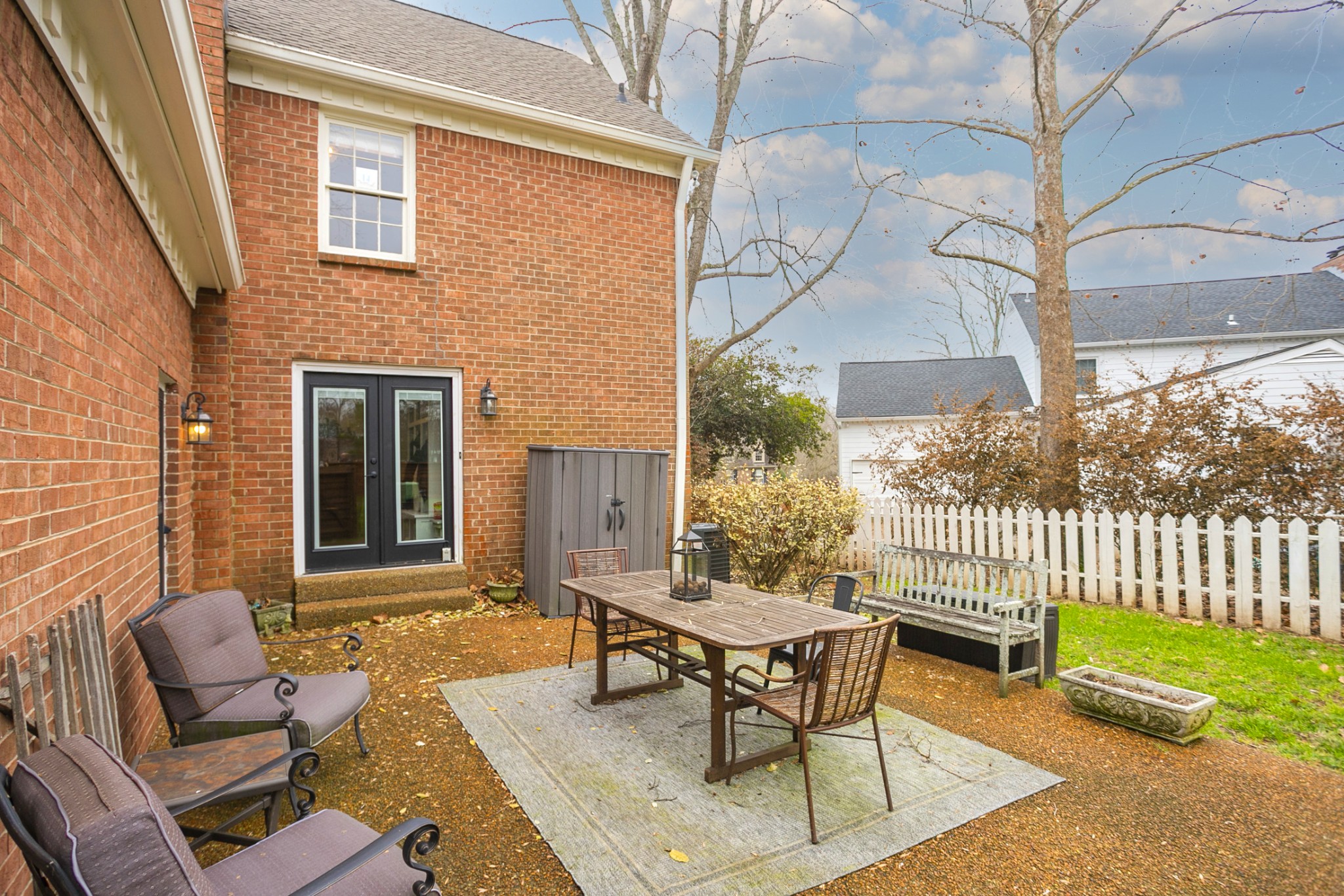 511 Arbor Drive Franklin, TN 37069 - Photo 22 of 24 a backyard of a house with barbeque oven table and chairs