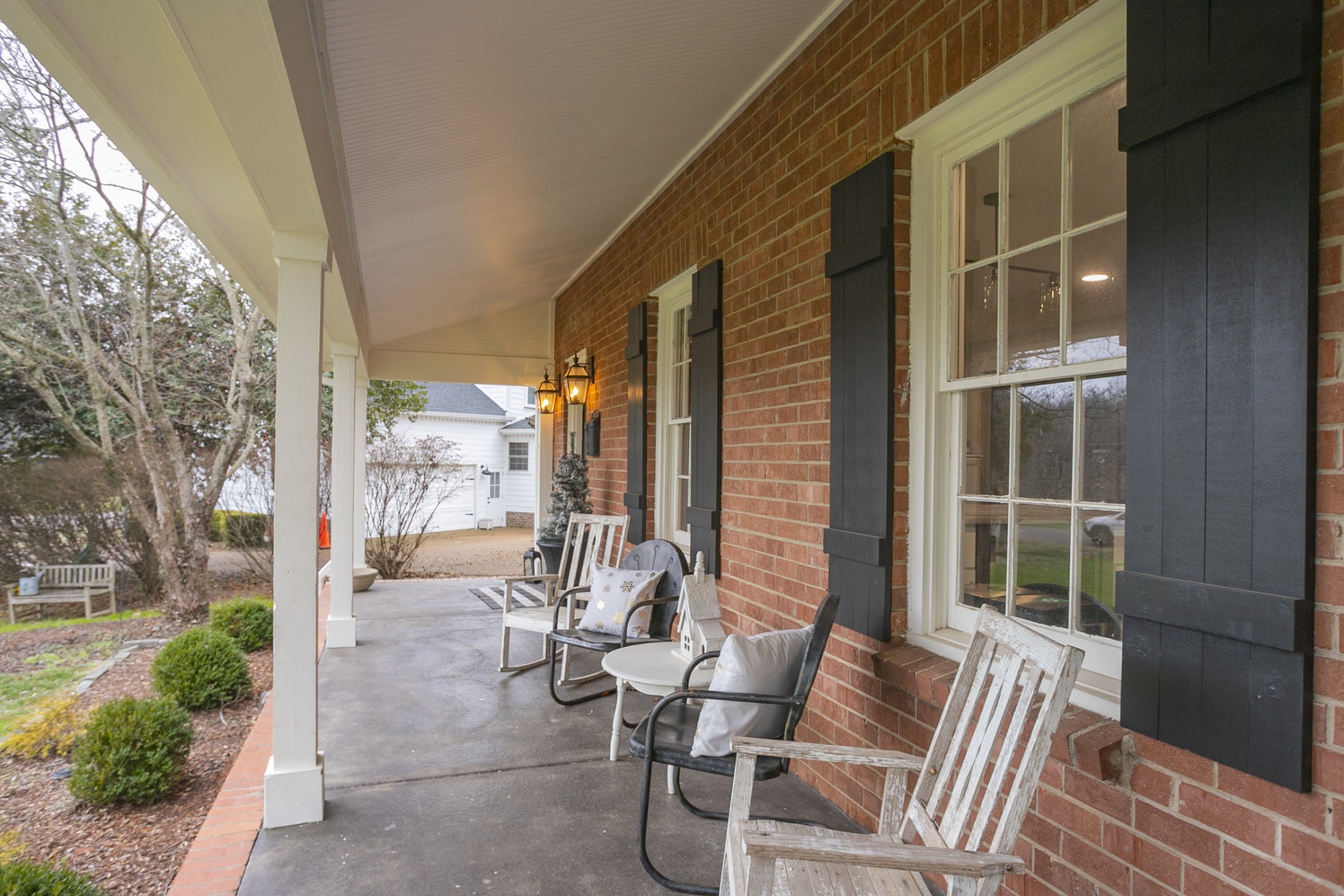 511 Arbor Drive Franklin, TN 37069 - Photo 3 of 24 a view of balcony with two chairs and a large window
