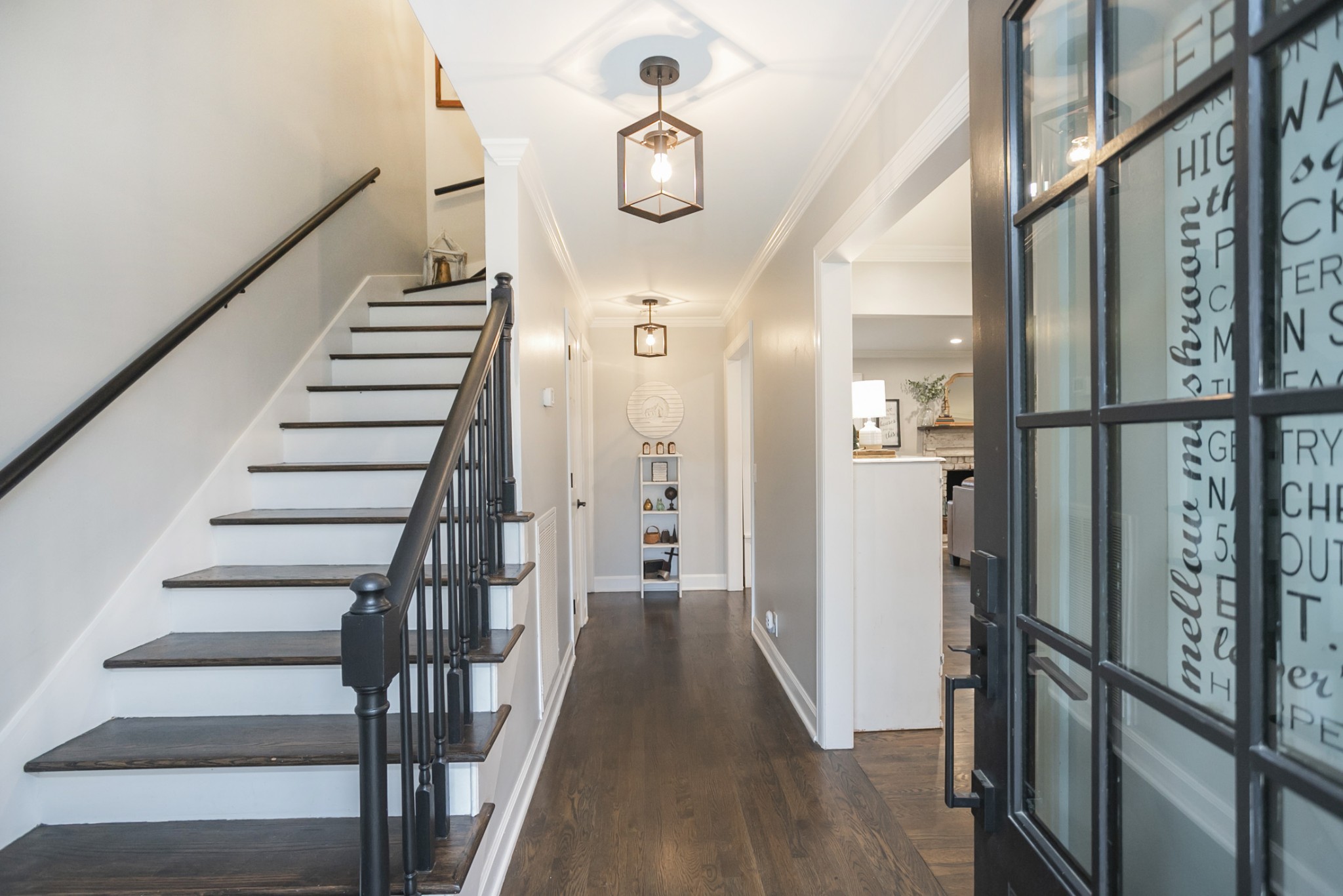 511 Arbor Drive Franklin, TN 37069 - Photo 5 of 24 a view of a hallway with wooden floor and staircase