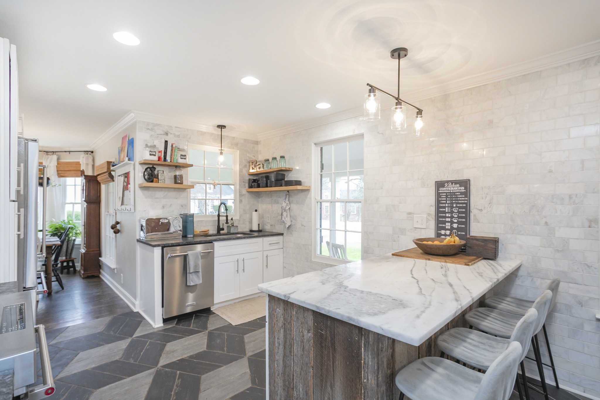 511 Arbor Drive Franklin, TN 37069 - Photo 8 of 24 a kitchen with stainless steel appliances granite countertop a stove a refrigerator a kitchen island a sink and a refrigerator