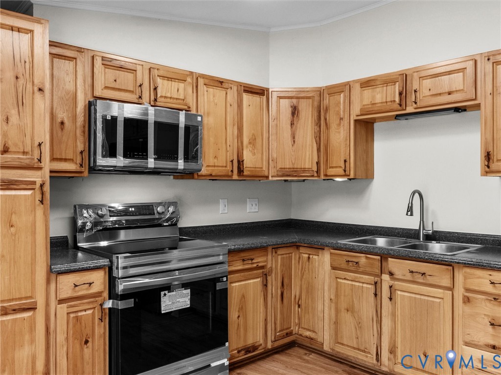 4772 Carsley Road Waverly, VA 23890 - Photo 8 of 38 Kitchen featuring appliances with stainless steel