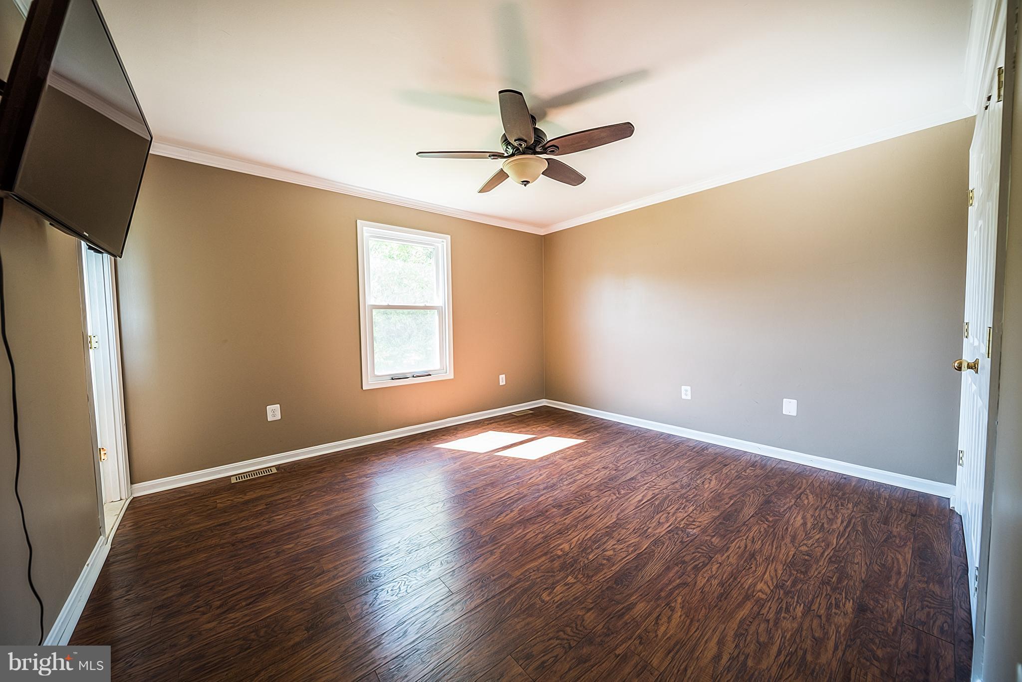 9511 Old Solomons Island Road Owings, MD 20736 - Photo 13 of 29 Bedroom (Master)