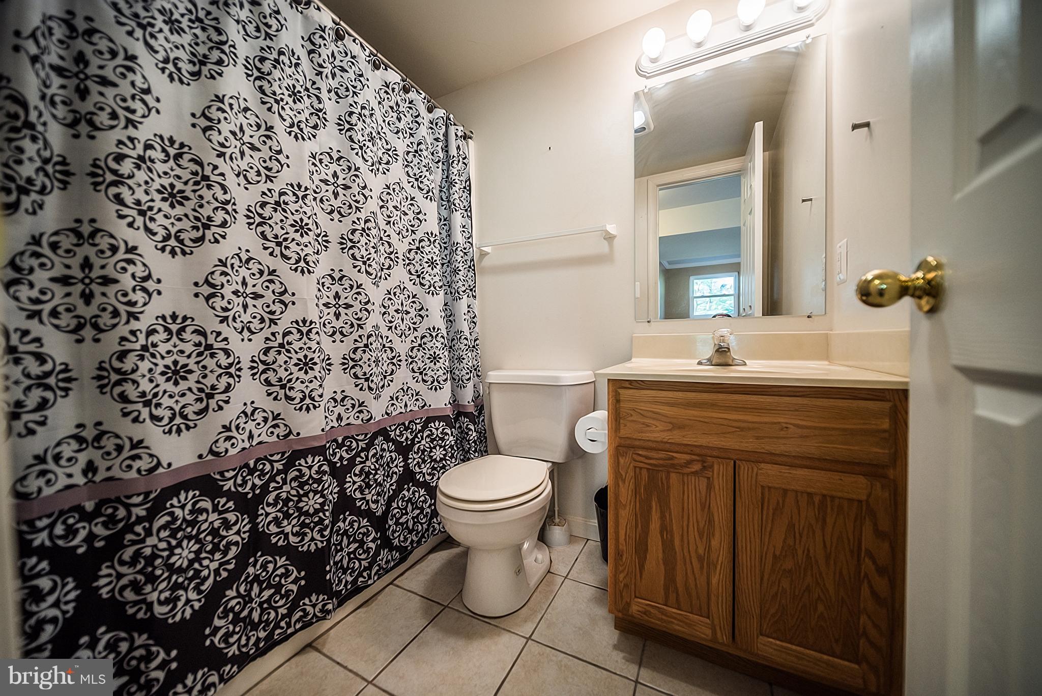 9511 Old Solomons Island Road Owings, MD 20736 - Photo 25 of 29 Bath
