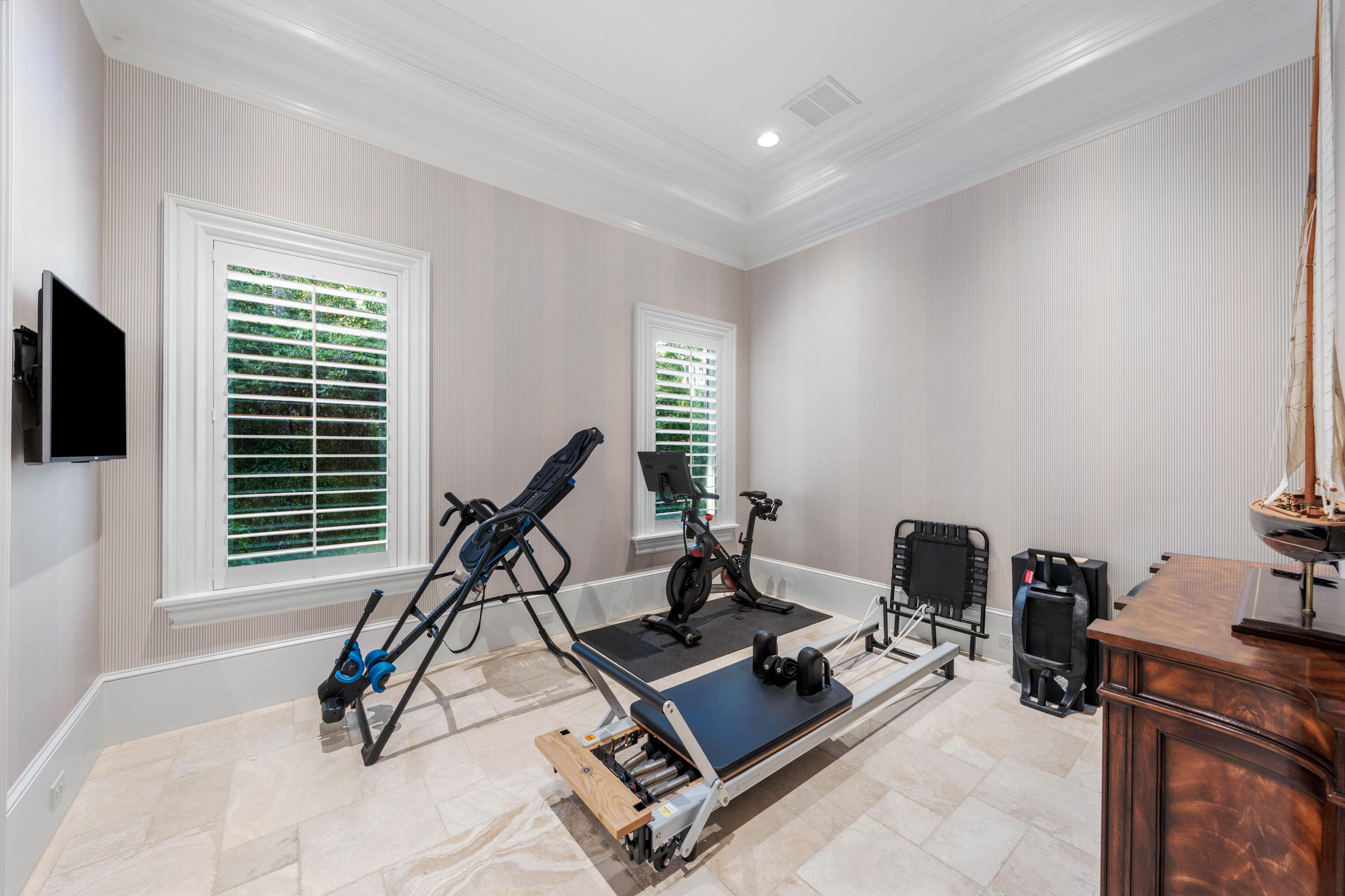 3570 Preserve Drive Miramar Beach, FL 32550 - Photo 48 of 86 a room with gym equipment and a flat screen tv