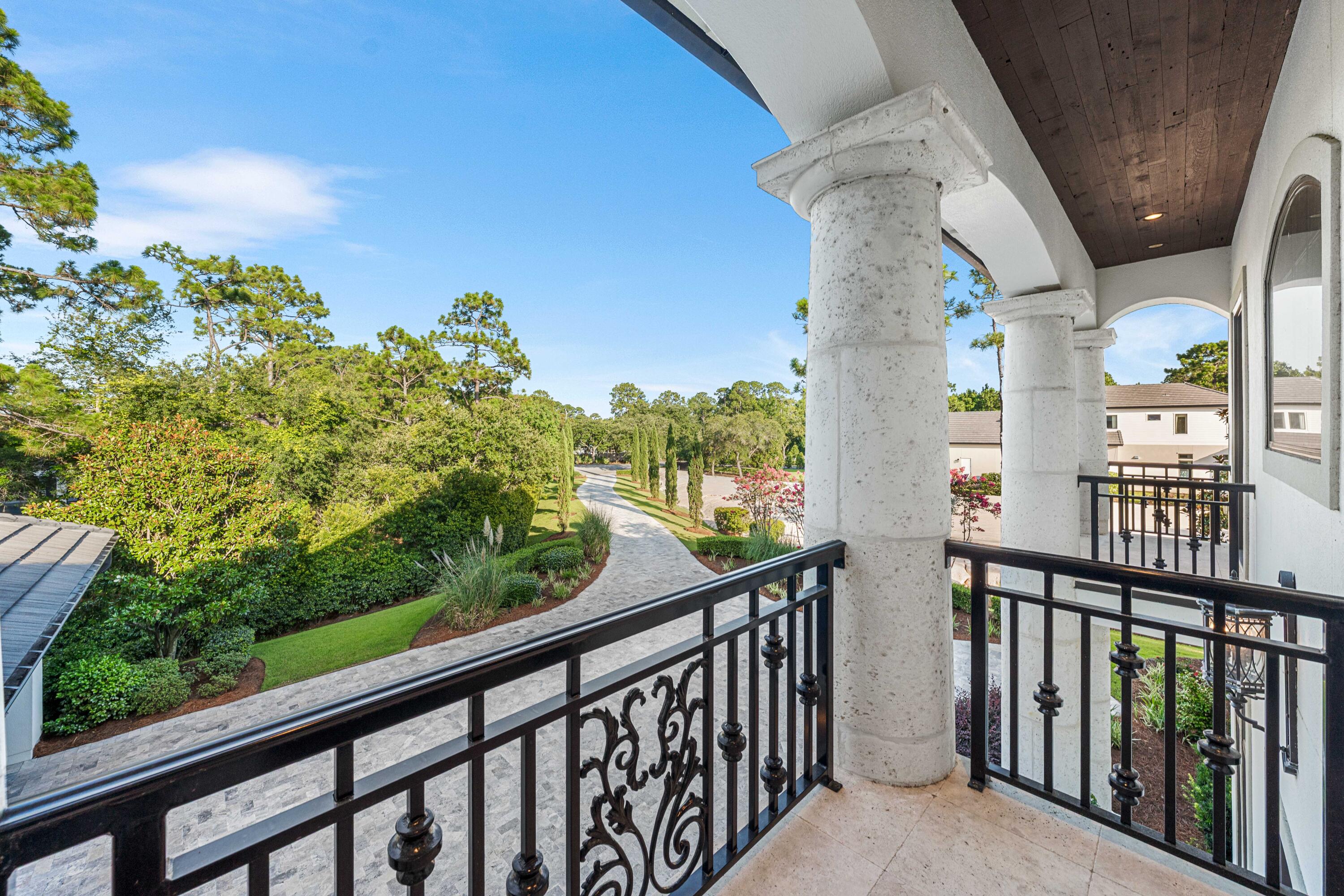 3570 Preserve Drive Miramar Beach, FL 32550 - Photo 62 of 86 a view of a balcony with flower plants