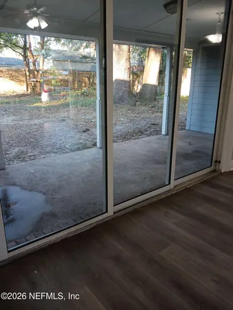 a view of a glass door and window