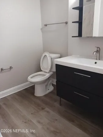 a bathroom with a sink and a toilet