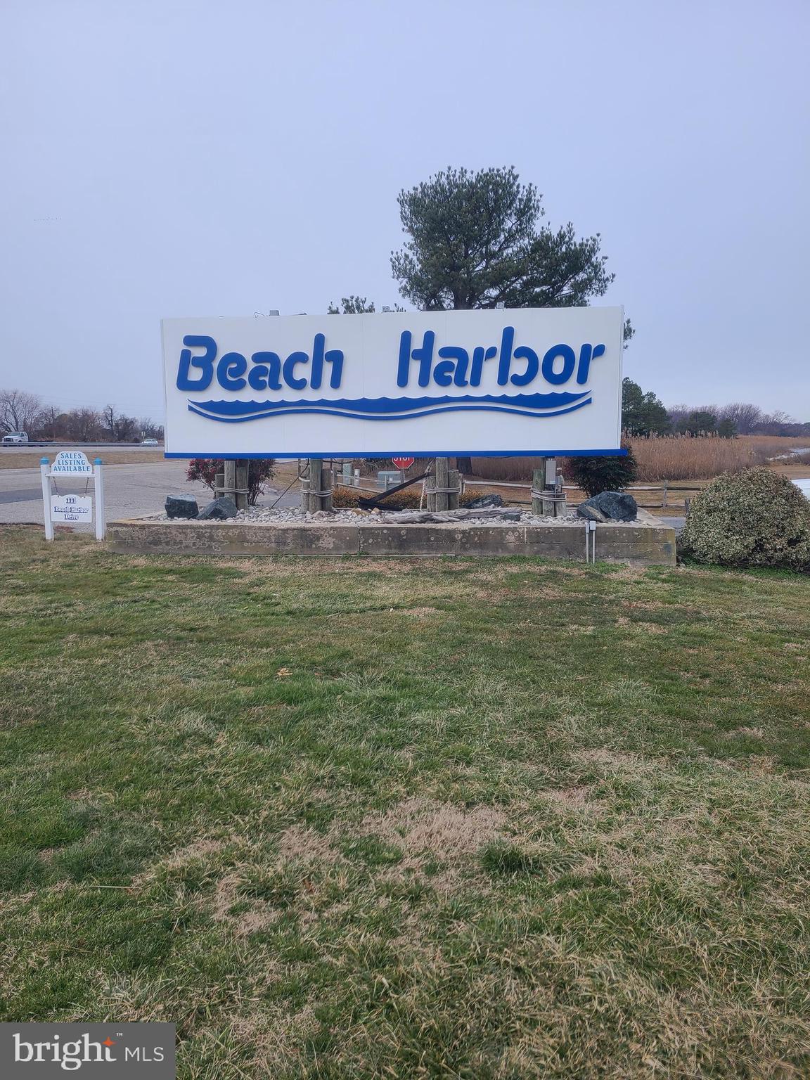 111 Beach Harbor Road, Unit B147 Grasonville, MD 21638 - Photo 16 of 24 Entrance Sign