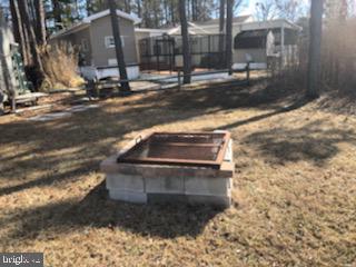111 Beach Harbor Road, Unit B147 Grasonville, MD 21638 - Photo 7 of 24 Firepit