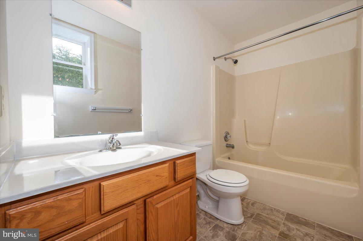 2723 Old Washington Road, Unit B Westminster, MD 21157 - Photo 19 of 37 a bathroom with a sink toilet and shower