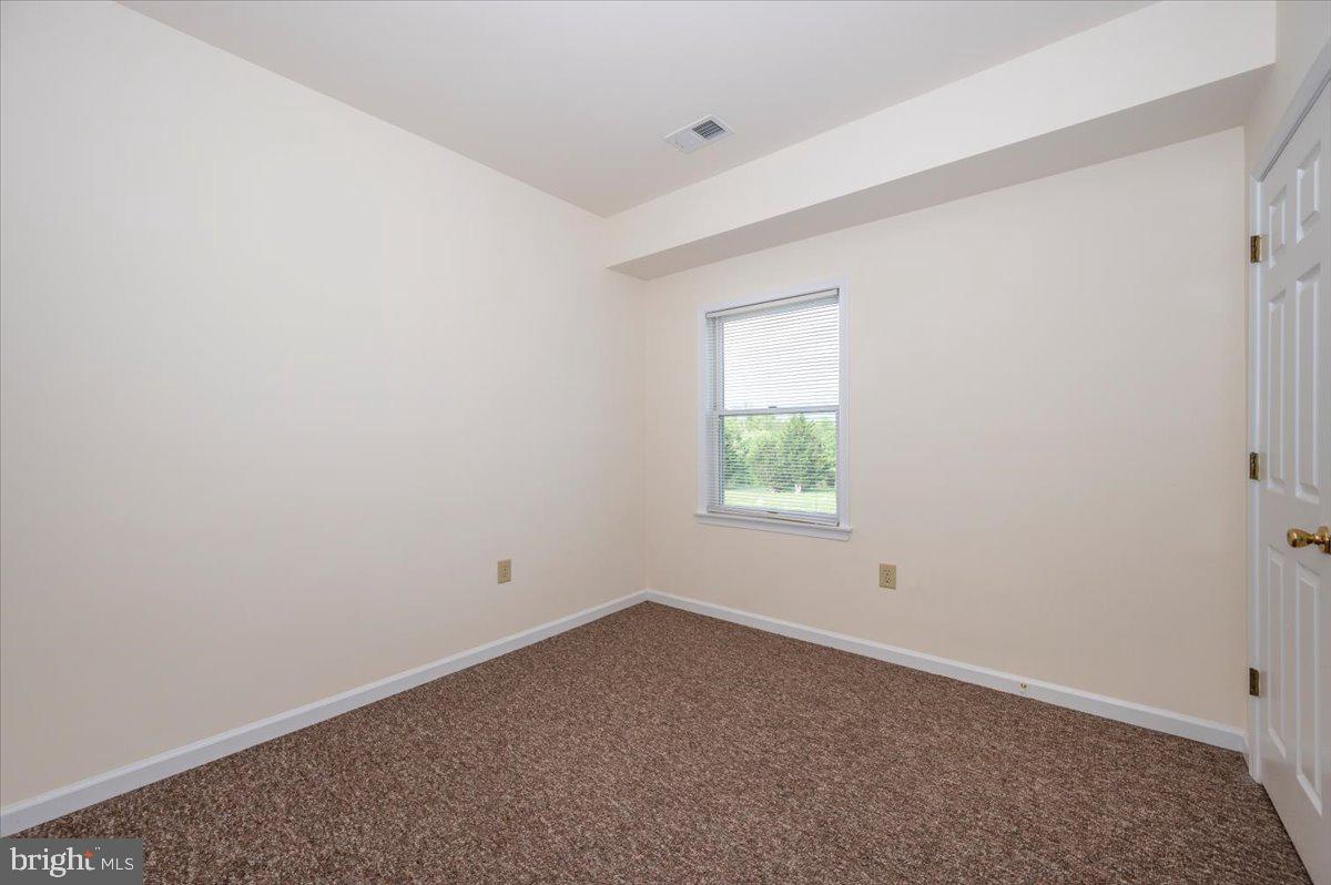 2723 Old Washington Road, Unit B Westminster, MD 21157 - Photo 20 of 37 an empty room with a window